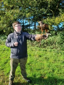 Man holding a falcon
