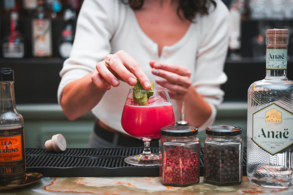 Women shaking cocktails