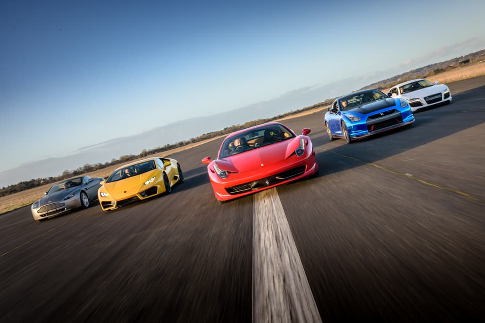 five supercars on a race track at car chase heroes driving experience day