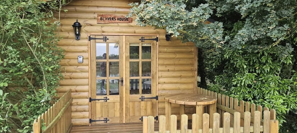 beavers house wooden cabin used for glamping experience in cambridgeshire