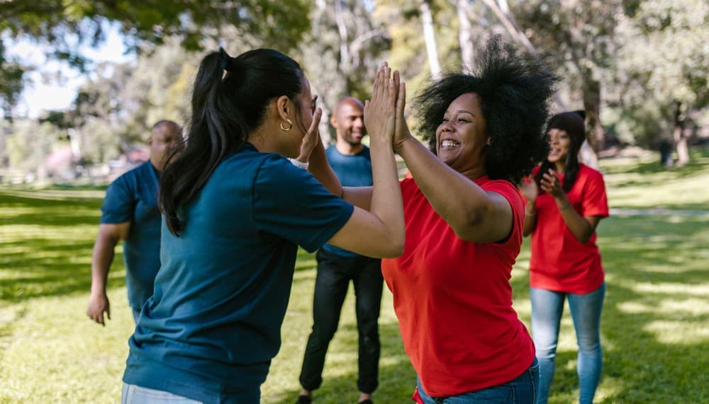 Group of people high fiving