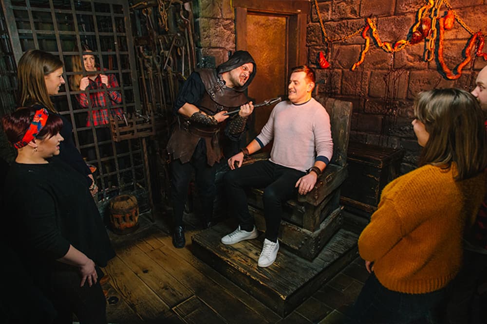 visitors enjoying the london dungeon experience in london