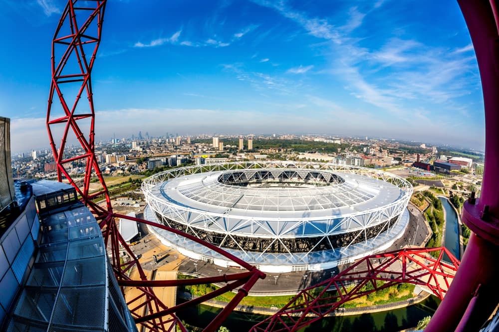 view over the london stadium and surrounding london skyline from the top of the arcelormittal orbit