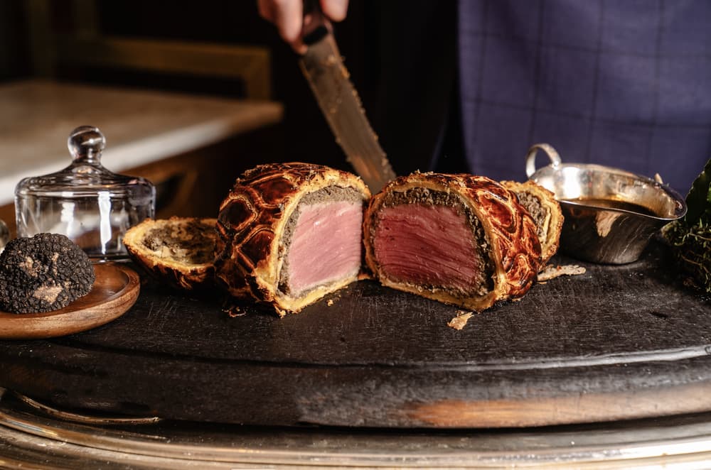 A beef wellington presented on board at corrigans mayfair