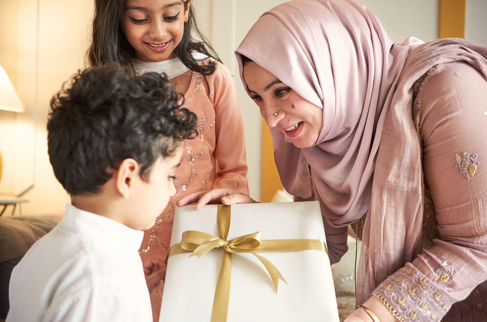Family receiving eid gifts