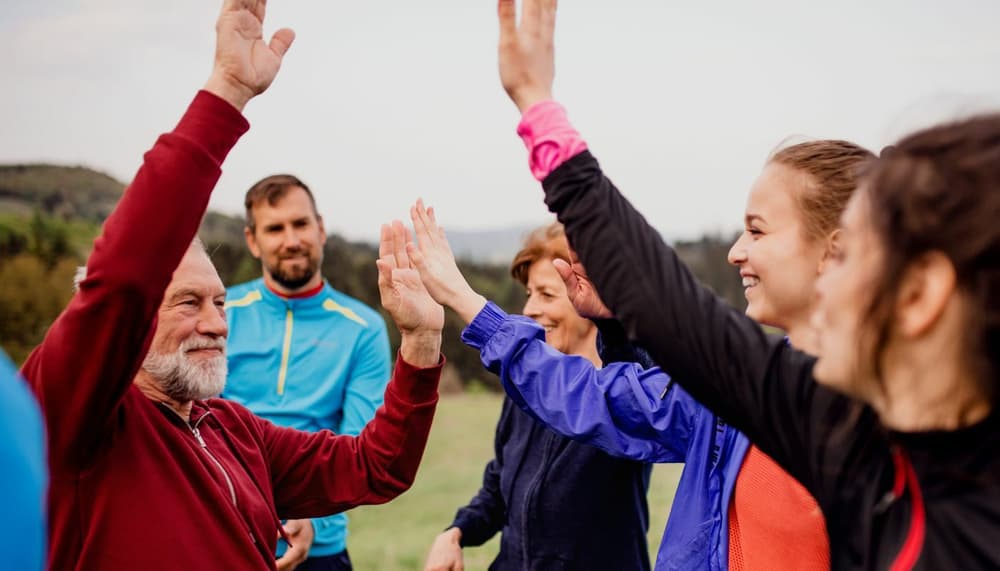 Group of people high fiving