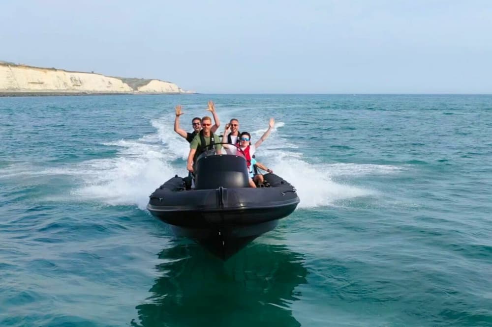 Group of people in a powerboat