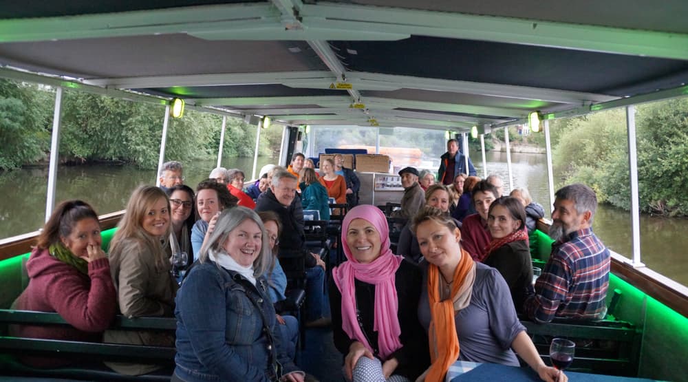 happy, smiling passengers on board the sabrina river cruise boat