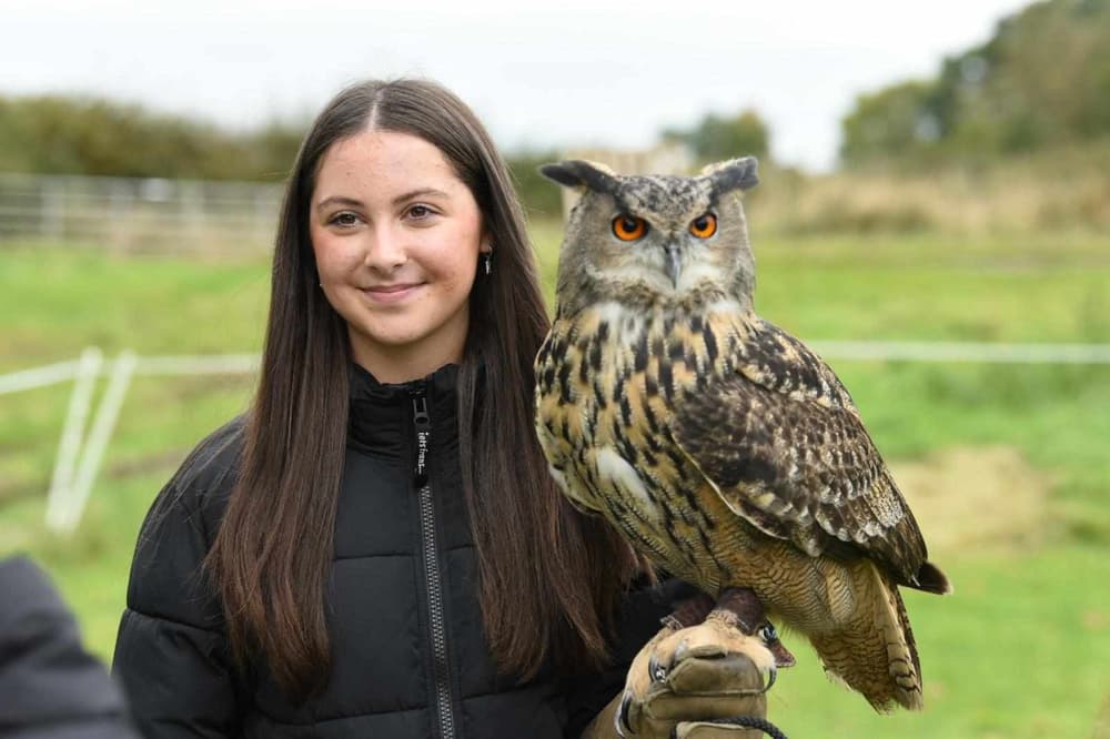 Lady holding an owl