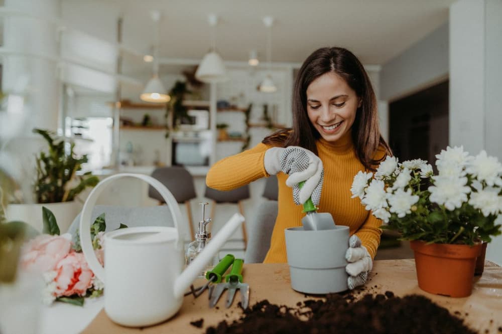 Lady planting flowers