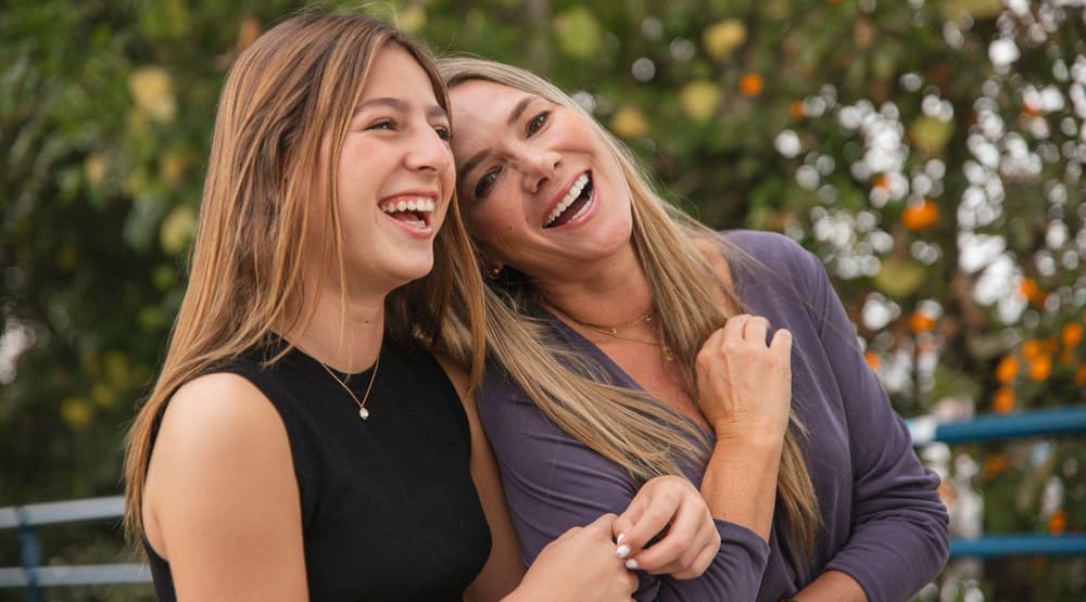 Mum and daughter laughing