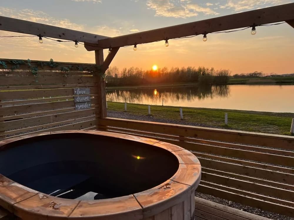 Outdoor hot tub and sunset
