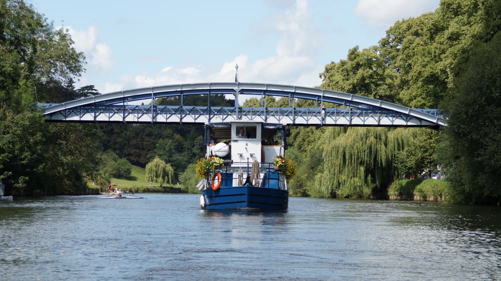 the sabrina river cruise boat sailing down the river severn on a sunny day