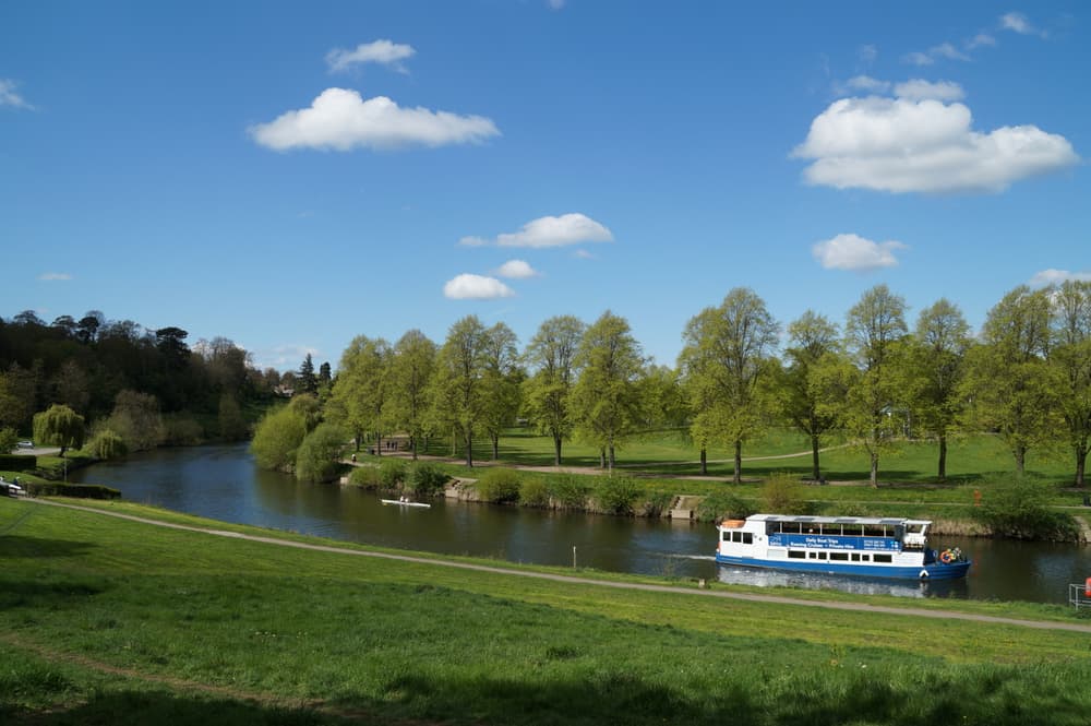 river cruise boat sailing down the river severn on a sunny day in shropshire