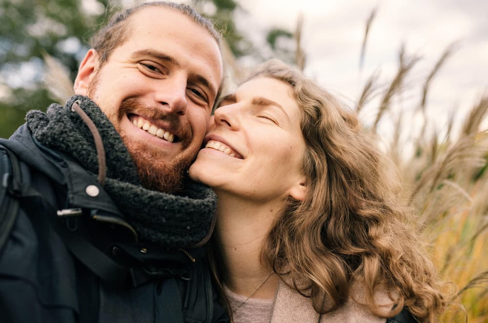 Woman hugging a man from behind