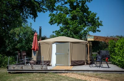 outside of the yurt at back of beyond glamping in dorset