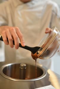 ingredients being poured into a mixer on a make your own gelato from scratch workshop in london