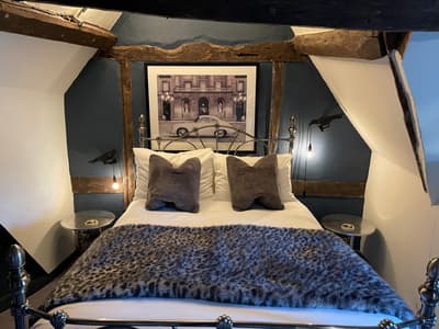 a hotel room used for an overnight stay with a rum and champagne afternoon tea