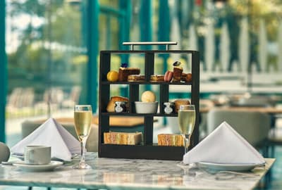 afternoon tea set up on a table at the crowne plaza hotel in marlow