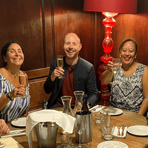 people enjoying champagne on an exotic london east end food tour