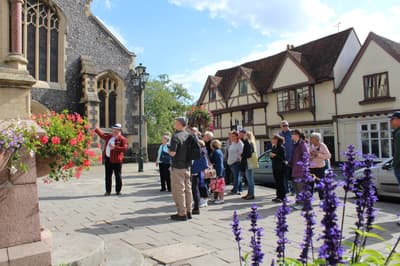 Guide talking to group in henley seen on a midsomer murders coach tour