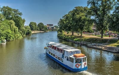 the sabrina river cruise boat sailing down the river severn on a sunny day