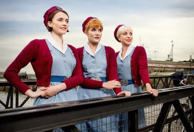 Three characters from call the midwife posing at chatham dockyard