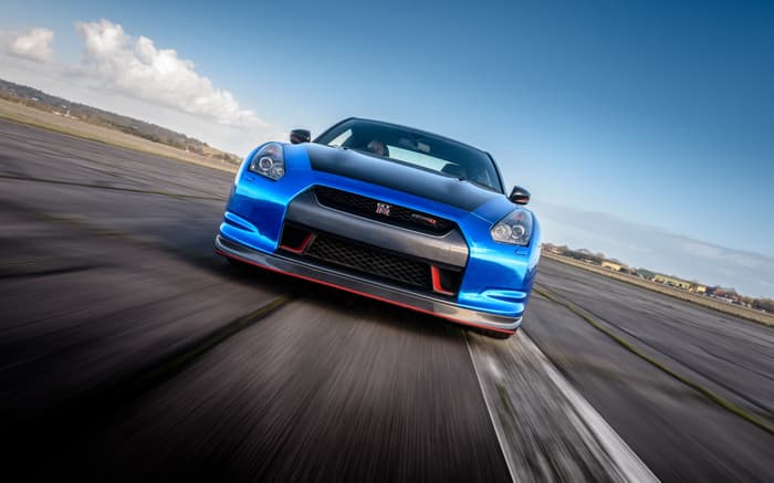 blue supercar on a race track at car chase heroes driving experience day