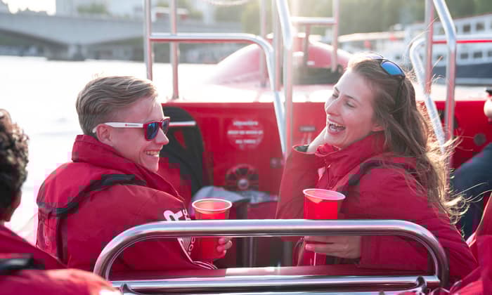passengers enjoying a thames rocket speedboat experience in london