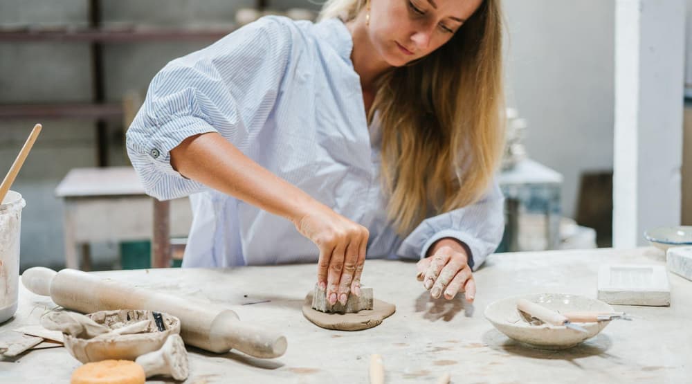 two women enjoying a pottery experience day