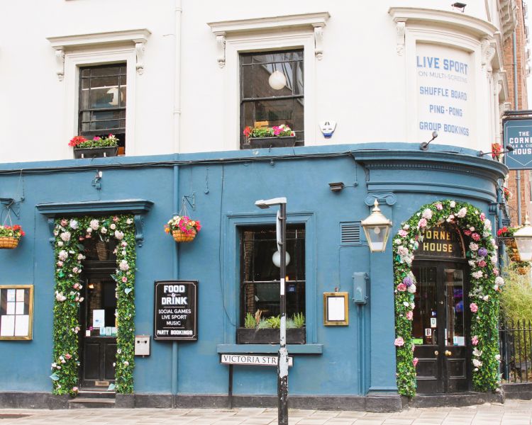 side of the front of the corner house pub