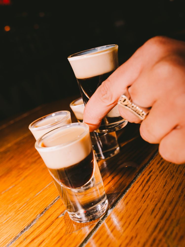 baby guinness shots on table at revolution bars