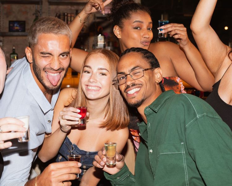 people having fun at revolution bars with shot roulette