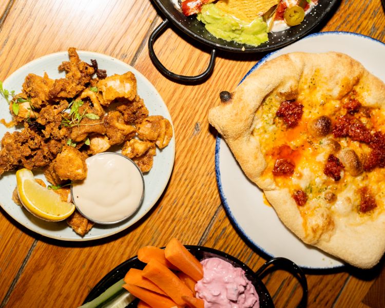 selection of small plates at revolution bars