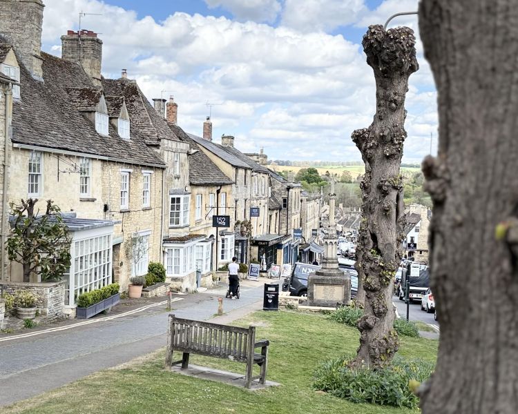 a street in a picturesque cotswold village on clarkson's farm tour