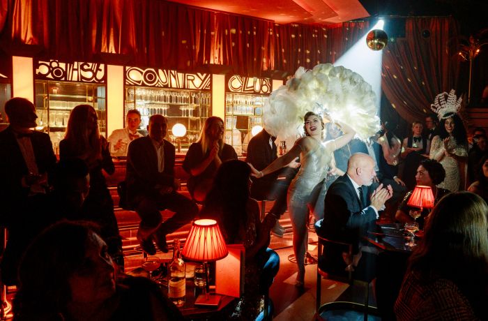 burlesque dancer at the 58th Street immersive experience in london