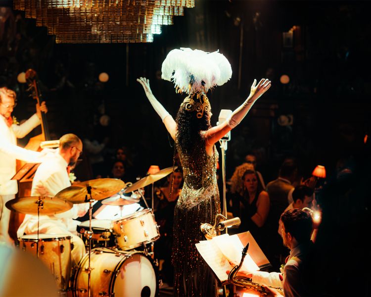 singer and band at the 58th Street immersive experience in london