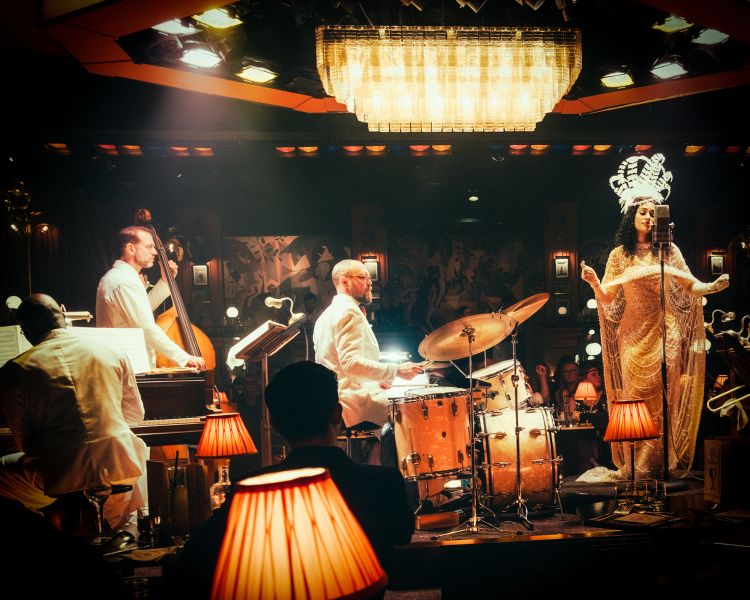 the stage with band and singer at the 58th Street immersive experience in london