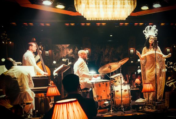 the stage with band and singer at the 58th Street immersive experience in london