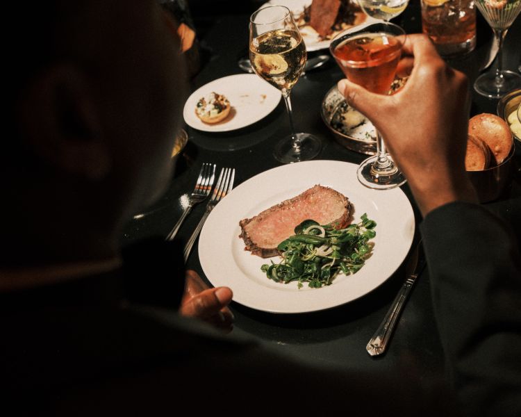 plate with steak at the 58th Street immersive experience in london