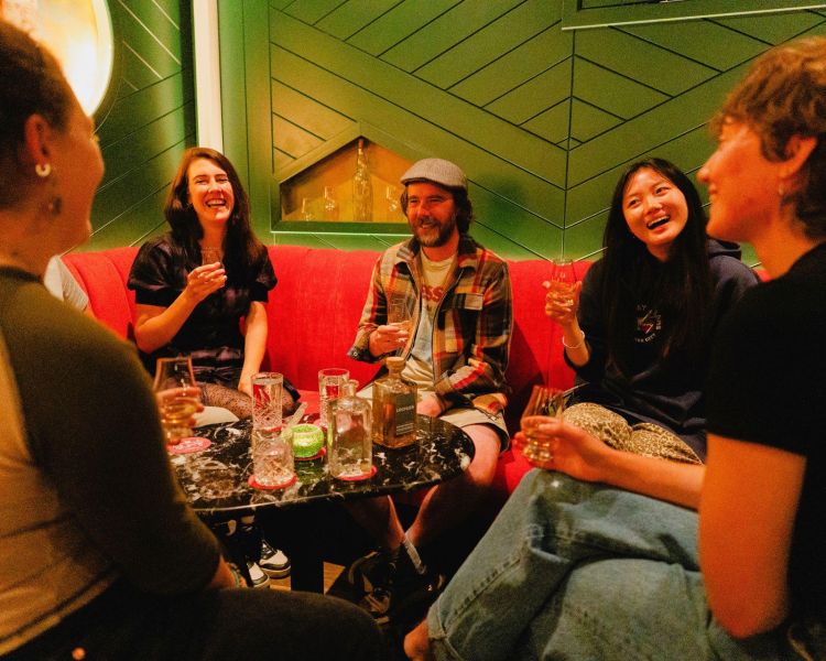 people in the whisky lounge enjoying drinks in edinburgh
