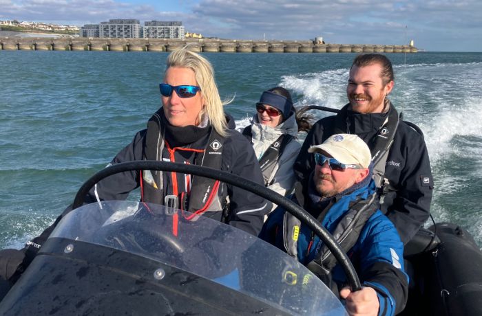people in a powerboat on a powerboat two day training course in brighton
