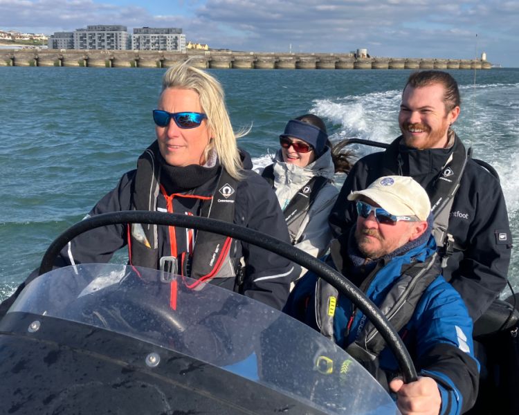 people in a powerboat on a powerboat two day training course in brighton