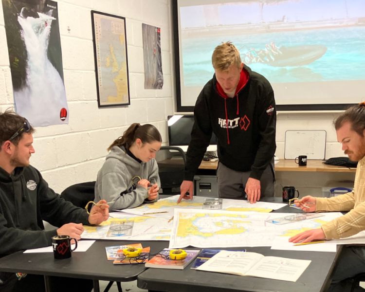 people learning the theory in classroom on a powerboat two day training course in brighton