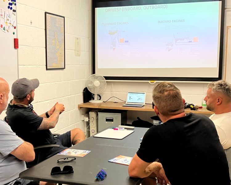 people learning the theory in classroom on a powerboat two day training course in brighton