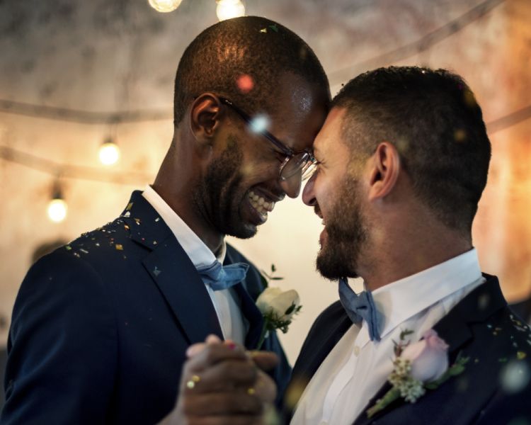 groom and groom dancing at their wedding