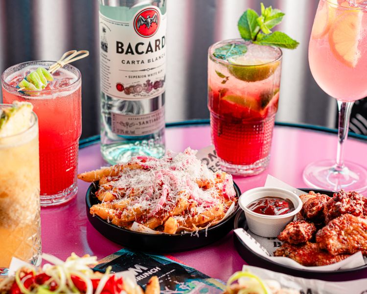 brunch with drinks on table at a boom battle bar