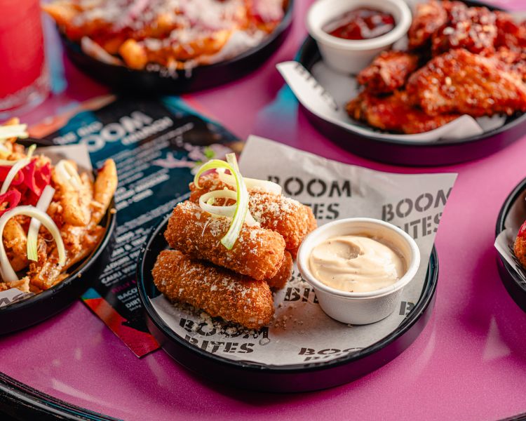 brunch with drinks on table at a boom battle bar