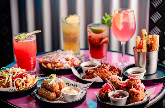 brunch with drinks on table at a boom battle bar