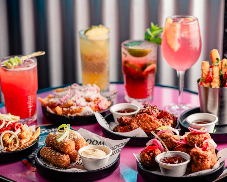brunch with drinks on table at a boom battle bar